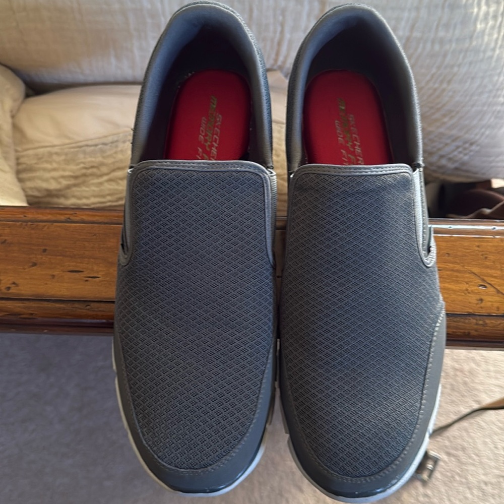 Sketchers wide fit memory foam slip on athletic shoes.  Size 14 gray worn once